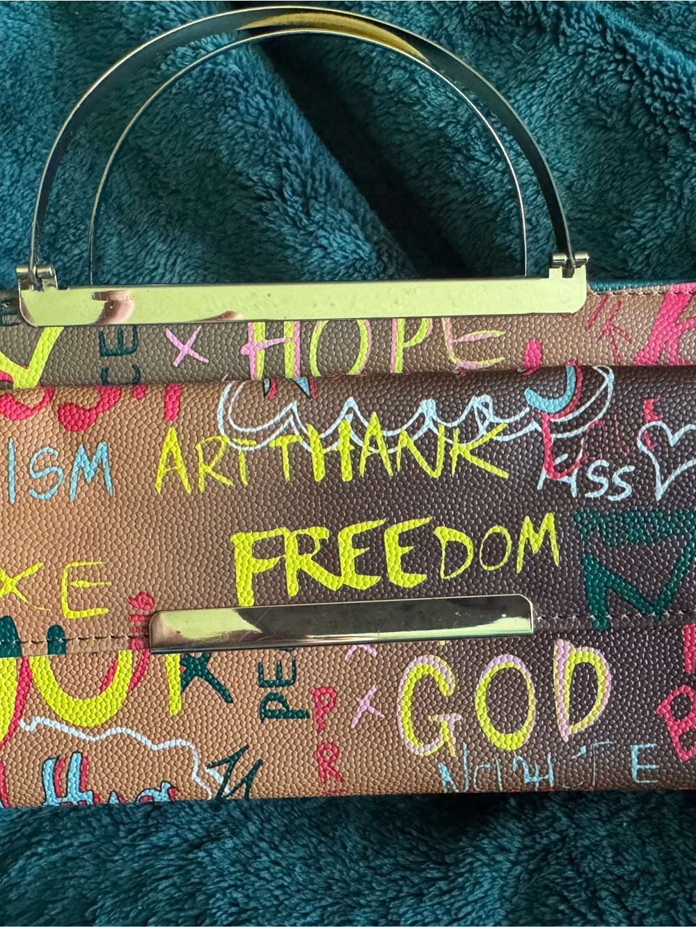 Graffiti-Print Brown Leatherette Clutch with Gold Hardware